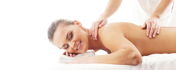 Young, beautiful and healthy woman in spa salon. Traditional massage therapy and skin care...