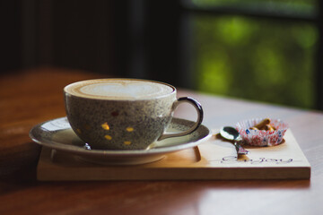 cup of coffee with sticks