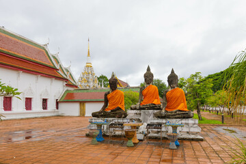 Fototapeta na wymiar The old three Buddha statue at Wat Phra Borommathat Chaiya, a destination for tourist in Surat Thani, Southern of Thailand.