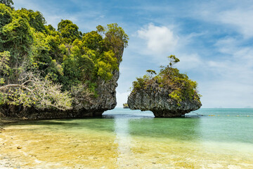 Mushroom or umbrella shape rock on beach at Koh Phak Bia Island in Andaman Sea, a destination of tourist in Krabi, Southern of Thailand