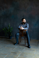 Portrait of an attractive young man with a beard