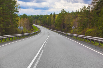 Country asphalt road in a forest area