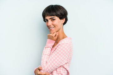 Young caucasian woman with a short hair cut isolated smiling happy and confident, touching chin with hand.