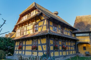 Beautiful yellow house from the collection of the Ecomuseum of Alsace in France