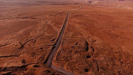 Beautiful view of a road through the field © Matheus Rebelo/Wirestock Creators