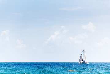 sailboat in ocean with copy space