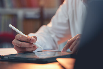 Businessman signing business contract agreement on digital tablet. Wireless connection concept. online transactions.