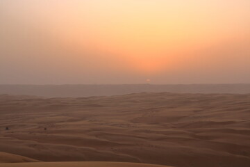 sunset in the desert Wahiba Sands in Oman