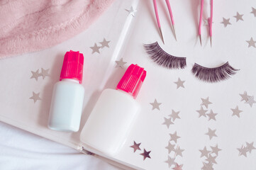 Obraz na płótnie Canvas Equipment for eyelash extensions in beauty salon, glue, tweezers, strip lashes