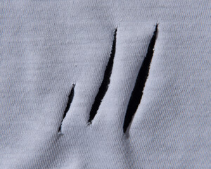 Clothes torn due to decay of the fabric,fabric damage