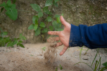 hands on sand