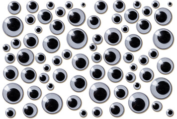 Googly eyes are small plastic craft supplies used to imitate eyeballs isolated on white background.