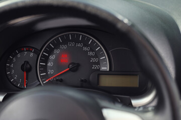 Closeup view of dashboard with warning icon check airbag system in car