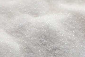 Fototapeta na wymiar Sweet granulated sugar as background, closeup view