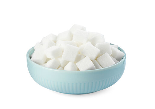 Bowl of sugar cubes isolated on white