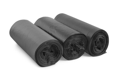 Rolls of different garbage bags on white background. Cleaning supplies