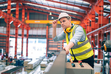 Portrait smart professional caucasian Industrial, factory engineer,technician,worker man stand confidence with safety helmet in steel metal sheet production, manufacture worker concept with copy space