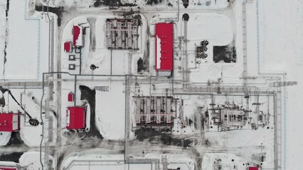 A drone flies over an oil and gas field, an industrial zone for oil and gas processing in Russia or...