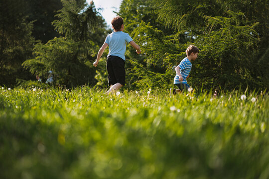 children having fun running in park