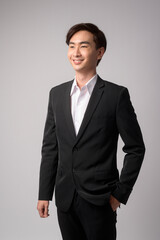 Young businessman wearing  suit over white background studio