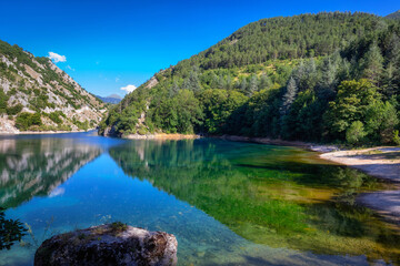 San Domenico lake, Abruzzo - Italy. Small lake surrounded by mountains and rocky spurs, in the...