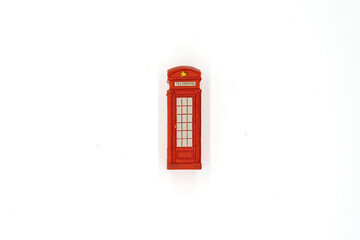 Barcelona, Spain - July 3, 2022. Fridge magnet. Phone booth in London. U. K., Isolated on white background.