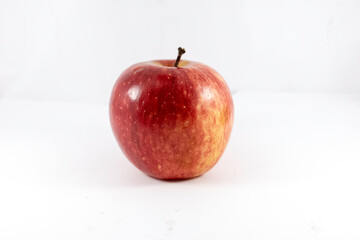 Red fuji apple isolated on white studio background