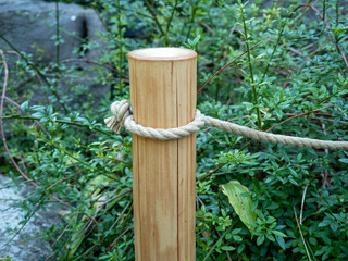 Handmade bamboo tree trunk fence.