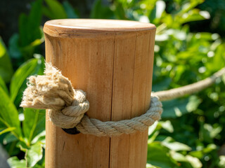 Handmade bamboo tree trunk fence.