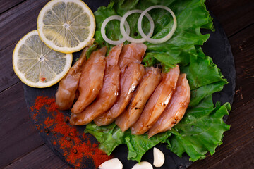 marinated chicken fillet on a white plate