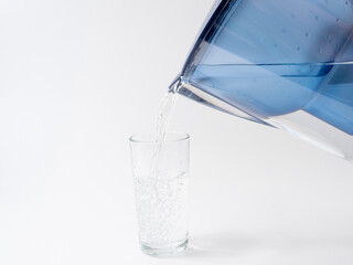 Jug with water filter made of transparent plastic.