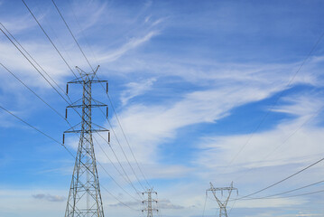 Fototapeta premium High voltage power transmission tower and sky background