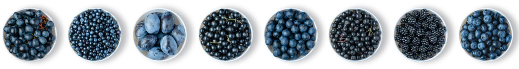 Ripe berries in plates. Isolated on a white background