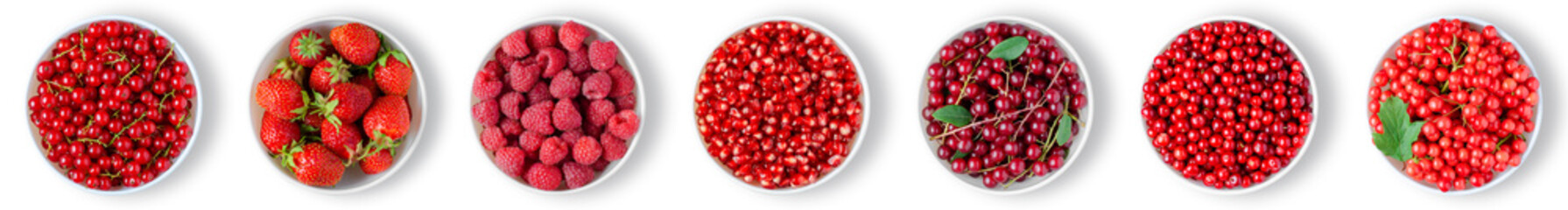 Ripe berries in plates. Isolated on a white background