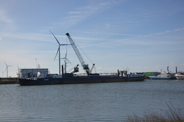 North sea Amstelmeer industrial shore. A view from Lutjestrand, Netherlands. 