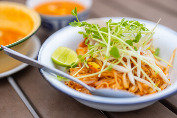 Chill spicy Tom yum soup and pad thai