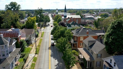 Neighborhood homes on main street in Charles Town, West Virginia, WV on a beautiful sunny day.