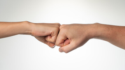 Two fists together gesture greeting friends bro