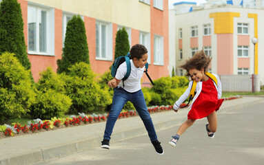 vivid emotions of two Black children running back to school