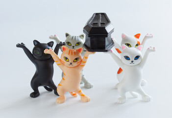Funny toy dancing kittens from the black coffin meme. Funeral procession dancing with the coffin....