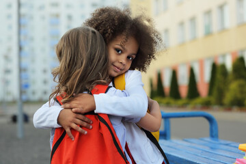 girls school friends support each other, hug and help to survive emotions
