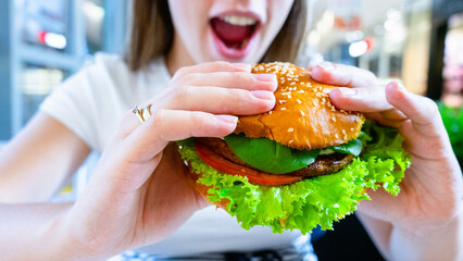 Hamburger vegan healthy vegetarian burger. Salad, avocado, vegetable on veggie sandwich eating cute...