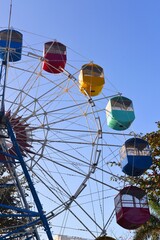 Colorful ferris wheel in an amusement park