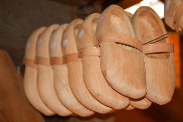 Koog aan de Zaan, Netherlands. July 2022.Traditional yellow wooden shoes or clogs in farmhouse, Old...
