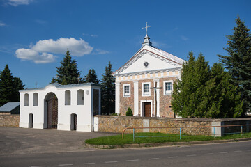 Fototapeta na wymiar Old ancient catholic temple of St Michael the Archangel in Porozovo, Grodno region, Belarus.