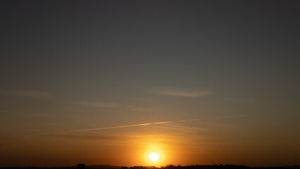 Sunset, beautiful sunset over a small town in Brazil, drone photo.