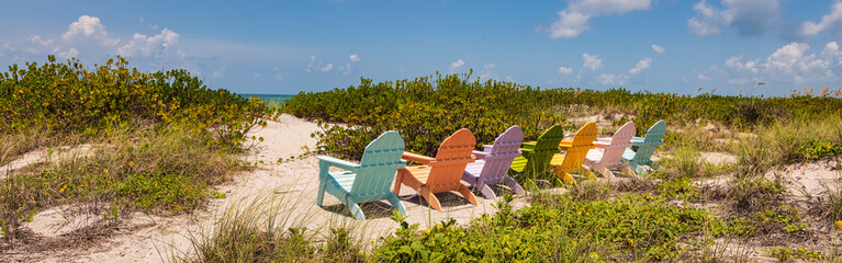 panoramic beautiful color chairs on the beach