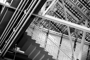 Stairs under metal roof of modern building