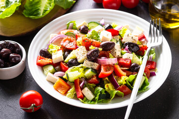 Greek salad. Vegetable salad with tomato, cucumber, feta cheese and olive oil.