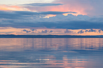 Vibrant sunset sky over Tuggerah Lake from Canton Beach in Toukley, NSW Australia